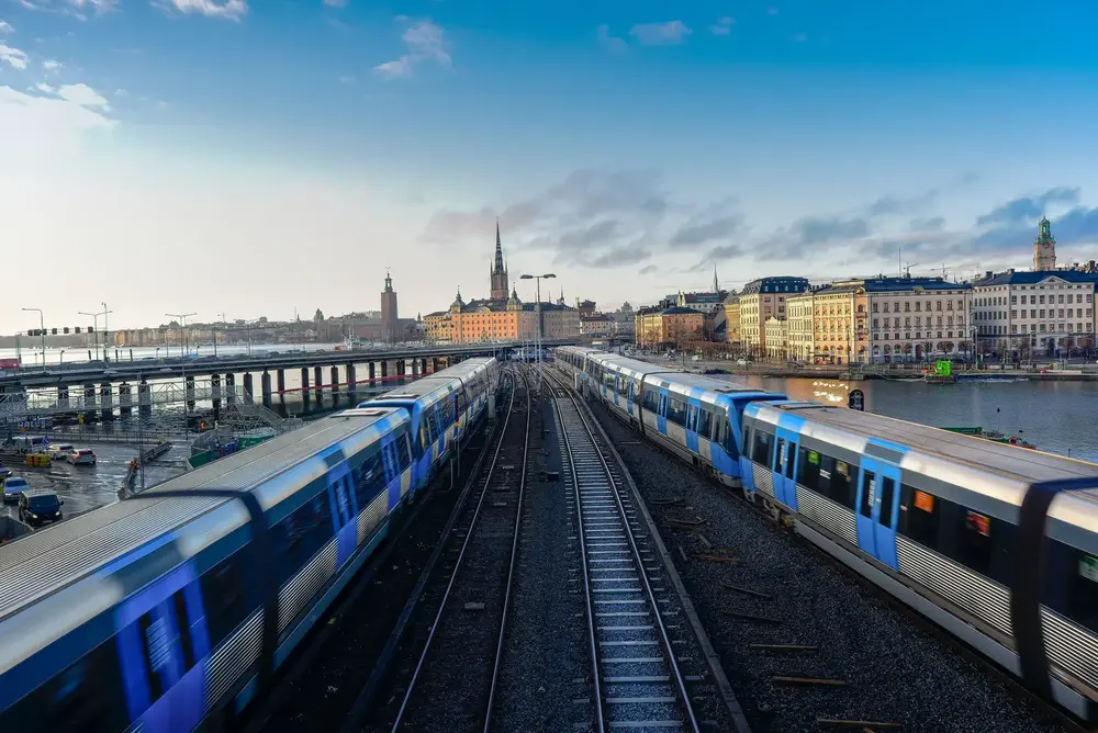 Passenger trains arriving in the train station.