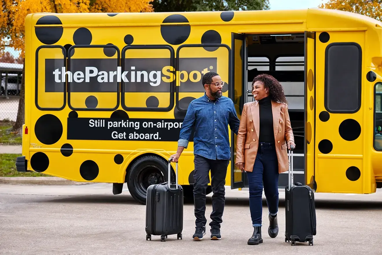 Guests of The Parking Spot depart the shuttle after a seamless airport parking experience.