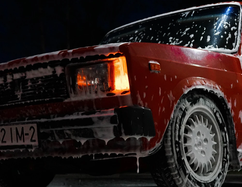 Red car being washed